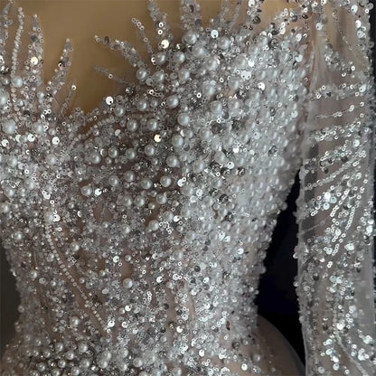 Long Sleeve Beaded Nude Tulle Evening Gown